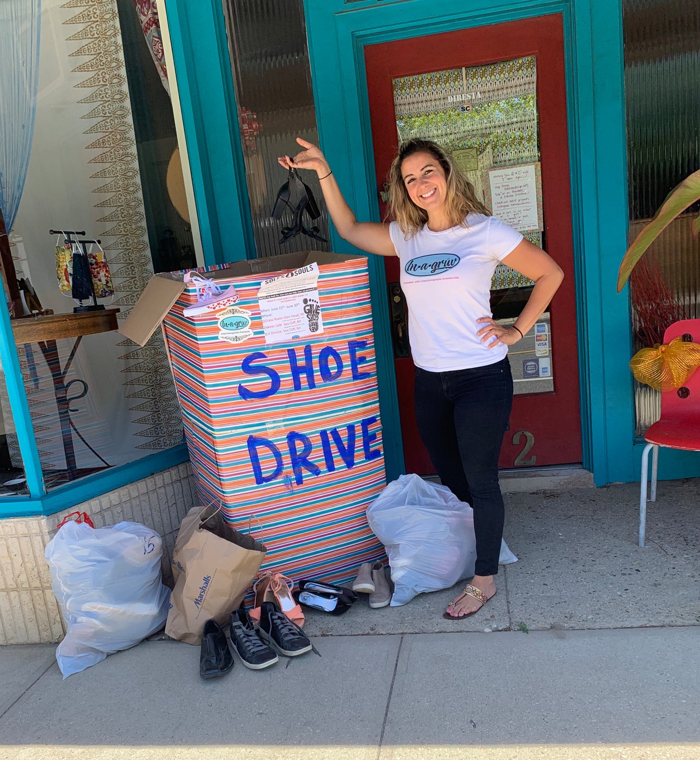 Collecting shoes for charity on the North Shore Herald Community